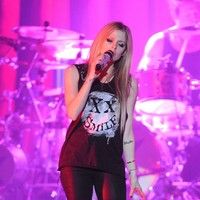 Avril Lavigne performs live during her Black Star Tour 2011 photos